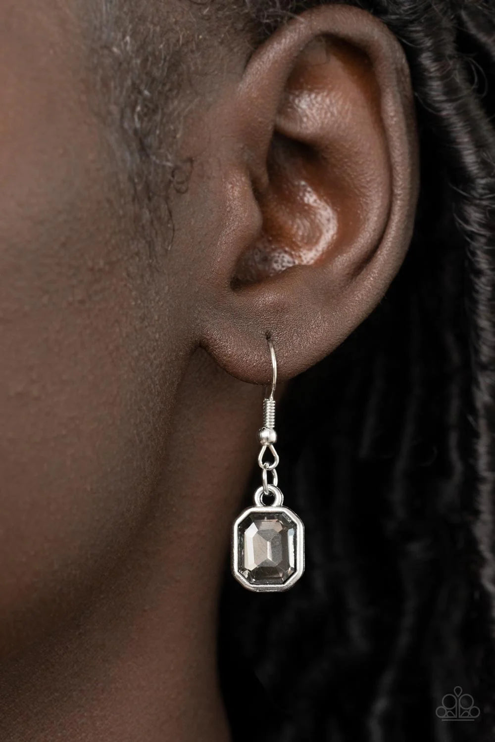 Paparazzi Accessories Divine IRIDESCENCE - Silver An oversized collection of radiant cut smoky and hematite gems delicately link at the bottom of two curved silver rods. Attached to shiny silver chains, the glamorously glitzy display sparkles below the co