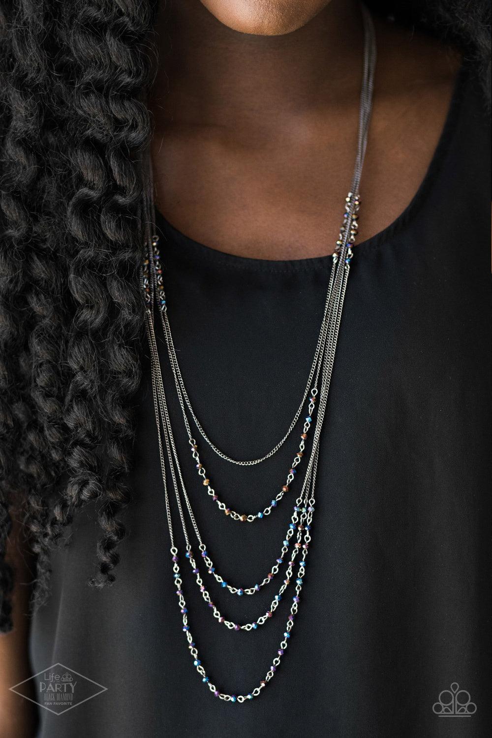 Paparazzi Accessories Glitter Go-Getter Brushed in a metallic iridescence, dainty beads trickle along gunmetal chains, creating shimmery layers across the chest. Featuring faceted edges, the glittery beads cascade down the sides of the palette for an addi