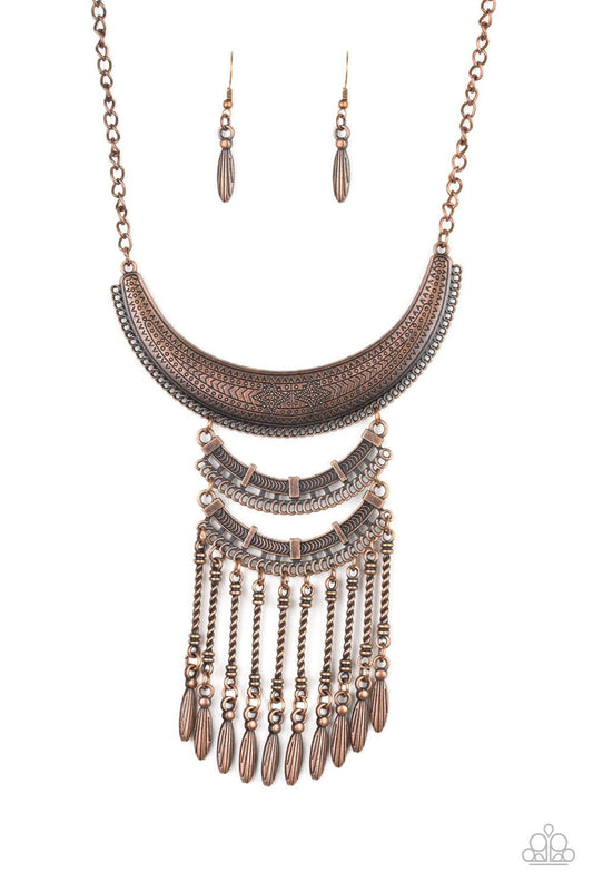 Paparazzi Accessories Eastern Empress - Copper Stamped and embossed in tribal inspired patterns, three copper plates connect down the chest, creating a fiercely stacked pendant. Attached to twisted copper rods, ornate copper beads swing from the bottom of