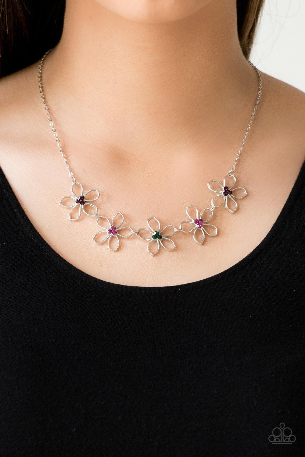 Paparazzi Accessories Hoppin Hibiscus - Multi Dotted with radiant multicolored rhinestone centers, airy silver flowers link below the collar for a seasonal look. Features an adjustable clasp closure. Sold as one individual necklace. Includes one pair of m