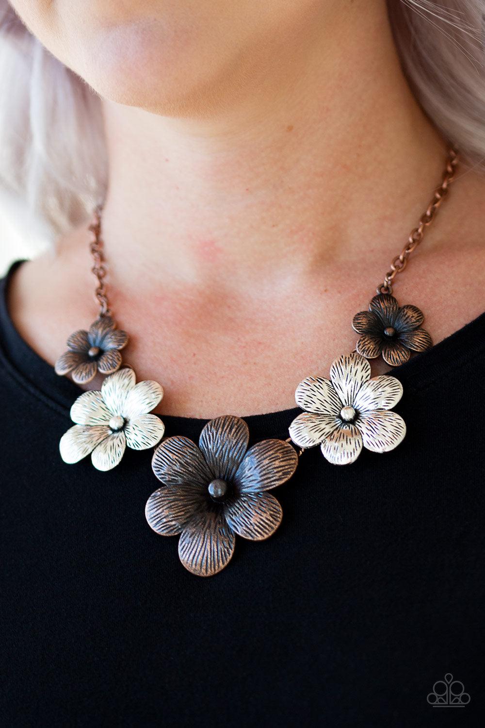 Paparazzi Accessories Secret Garden - Multi Brushed in an antiqued shimmer, lifelike copper and silver flowers gradually increase in size as they link below the collar in a seasonal fashion. Features an adjustable clasp closure. Sold as one individual nec