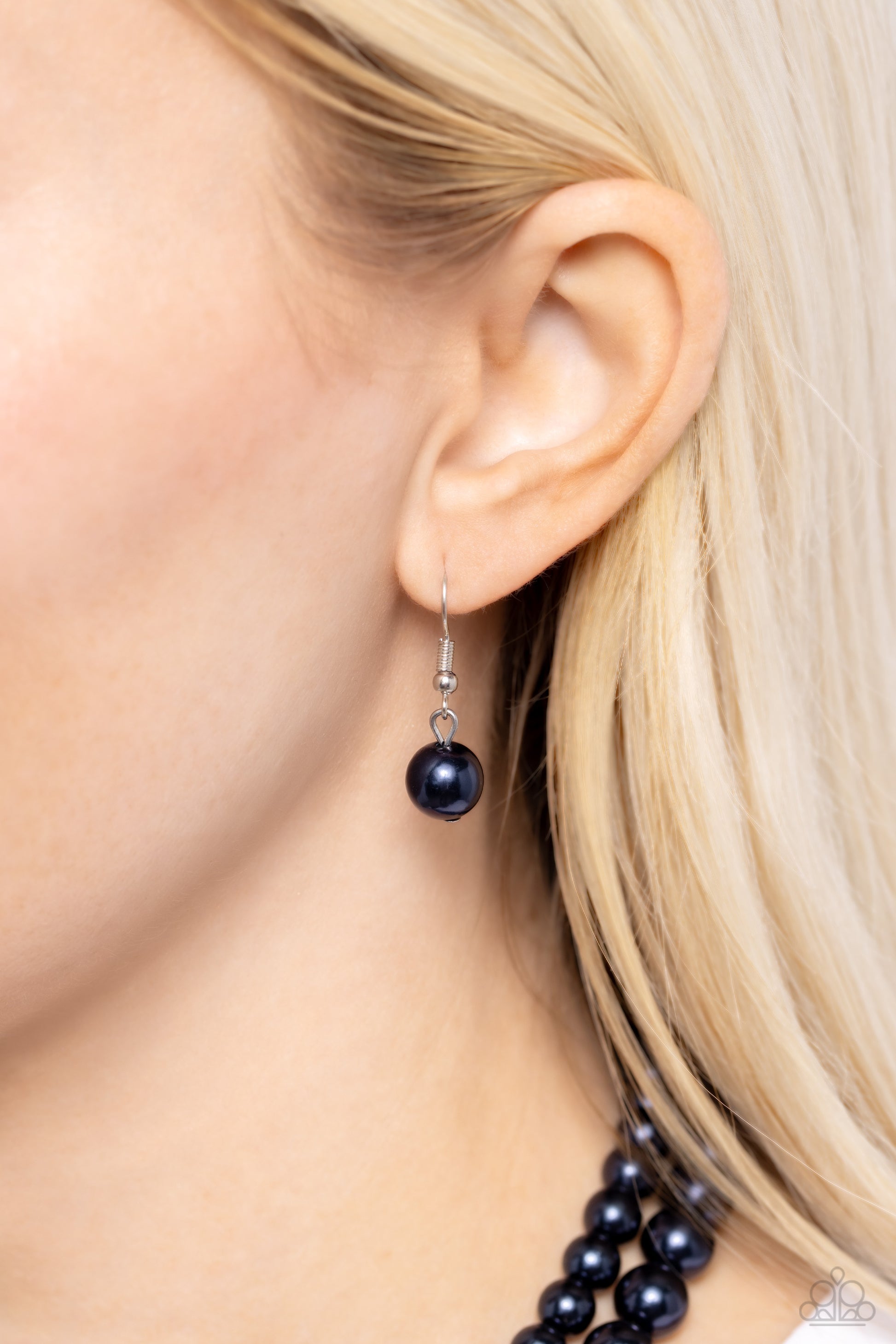 Paparazzi Accessories Woman Of The Century - Blue Two strands of classic blue pearls are strung along invisible wires below the collar. Each strand slightly varies in size, adding a modern twist to the timeless pearl palette. Features an adjustable clasp