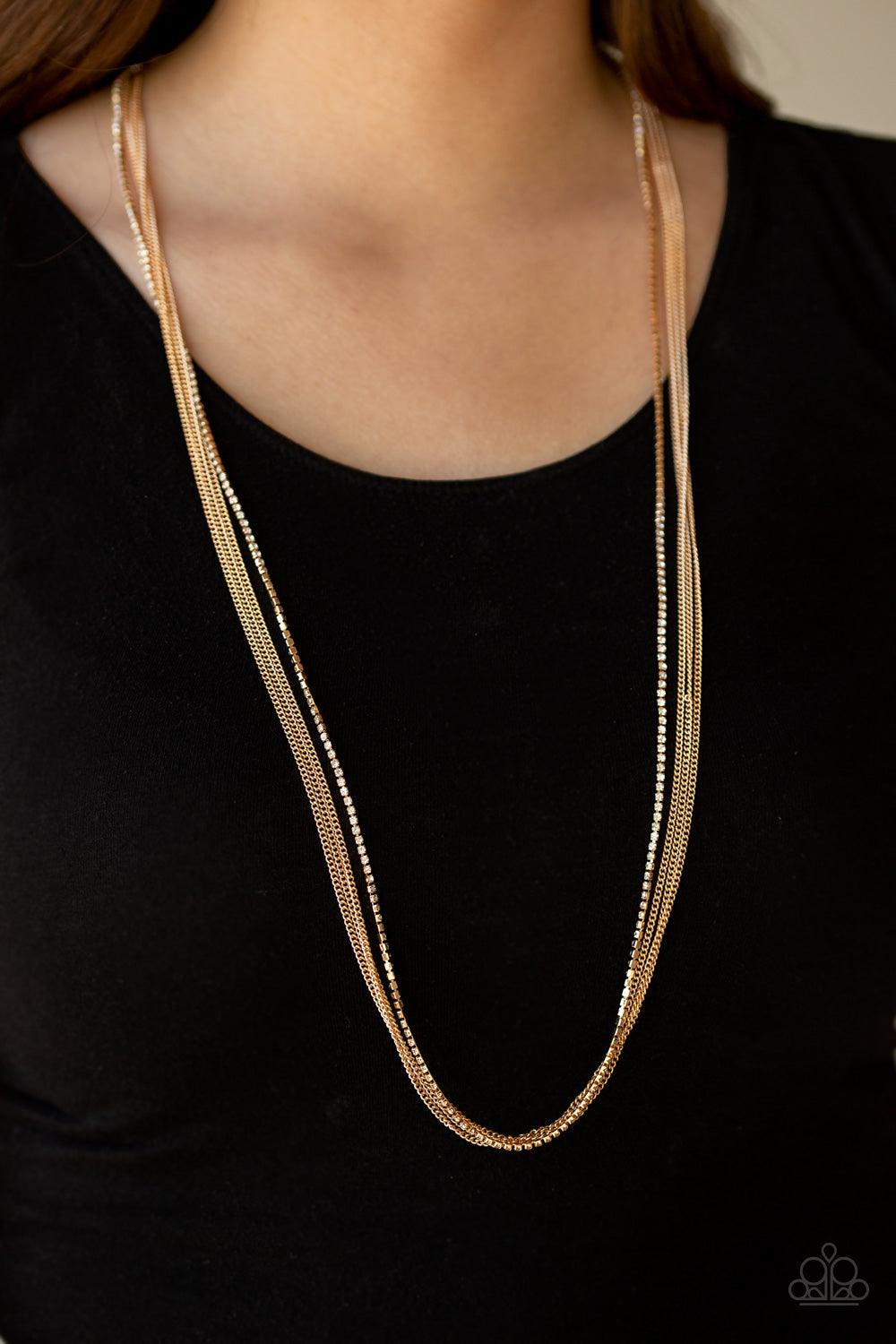 Paparazzi Accessories SLEEK and Destroy - Gold Featuring sleek square fittings, a glittery strand of white rhinestones joins dainty rows of glistening gold chains down the chest for a refined flair. Features an adjustable clasp closure. Sold as one indivi