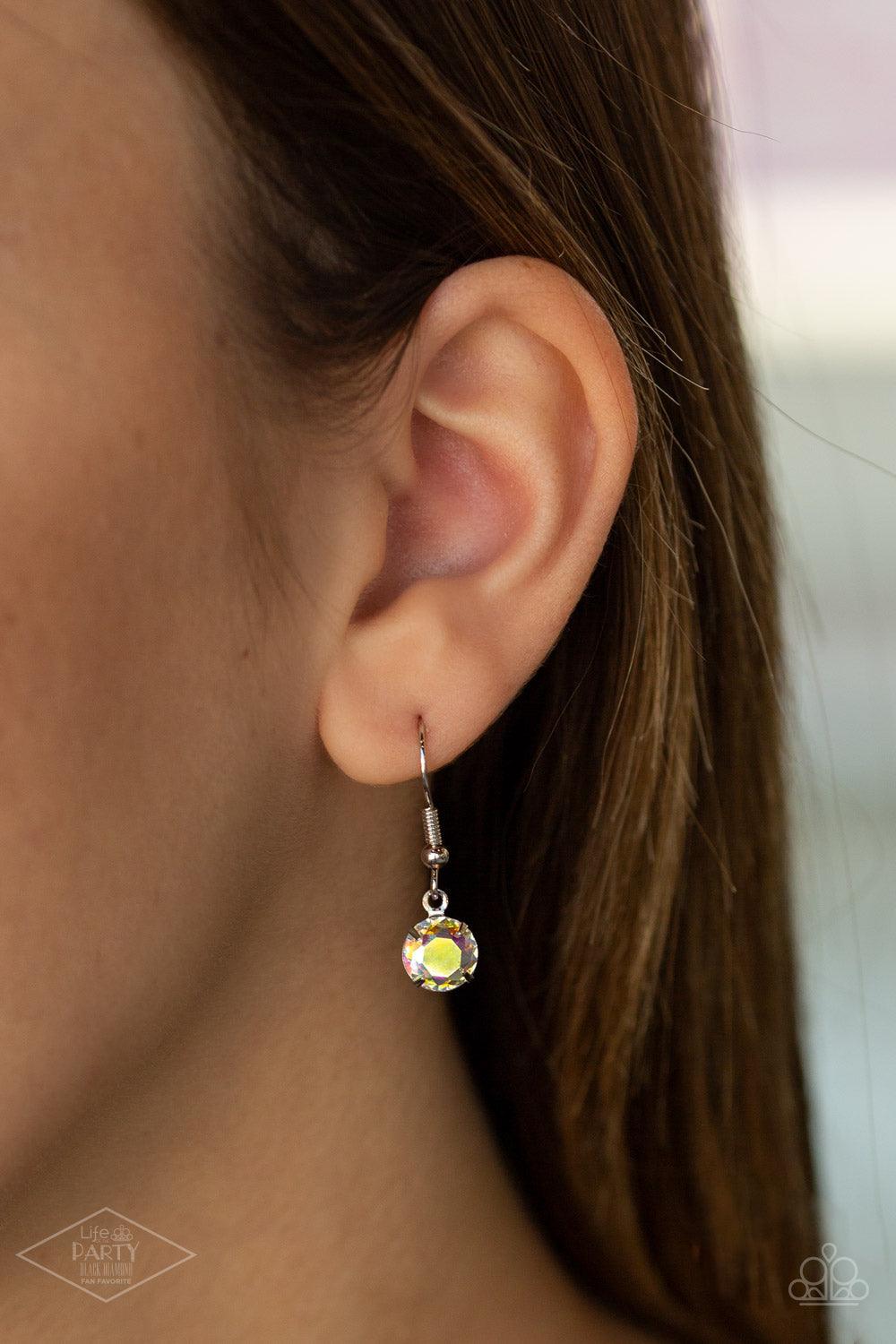 Paparazzi Accessories What A Gem - Multi A single iridescent rhinestone sparkles brilliantly at the bottom of a dainty silver chain, creating a stunning solitaire design. Features an adjustable clasp closure. Sold as one individual necklace. Includes one