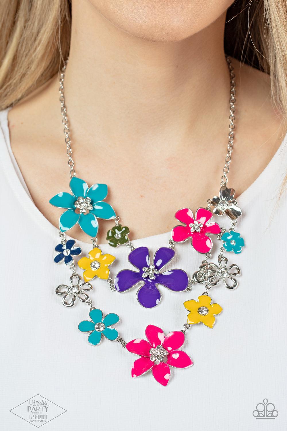 Paparazzi Accessories Zi Collection Necklace 2013 - Multi Painted in vivacious shades of blue, pink, purple, and yellow, a collection of colorful and plain silver floral-shaped frames bloom below the collar in three vivacious rows. Dainty white rhinestone