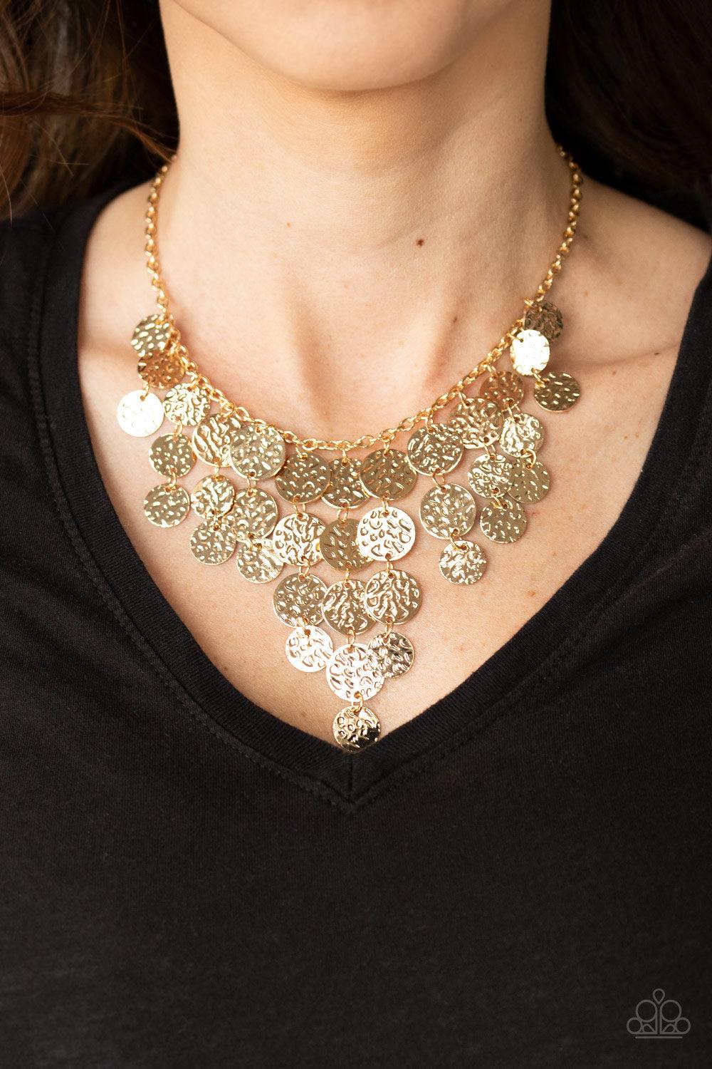 Paparazzi Accessories Spotlight Ready - Gold Rows of hammered gold discs trickle from the bottom of a dainty gold chain, creating an edgy tapered fringe below the collar. Features an adjustable clasp closure. Sold as one individual necklace. Includes one