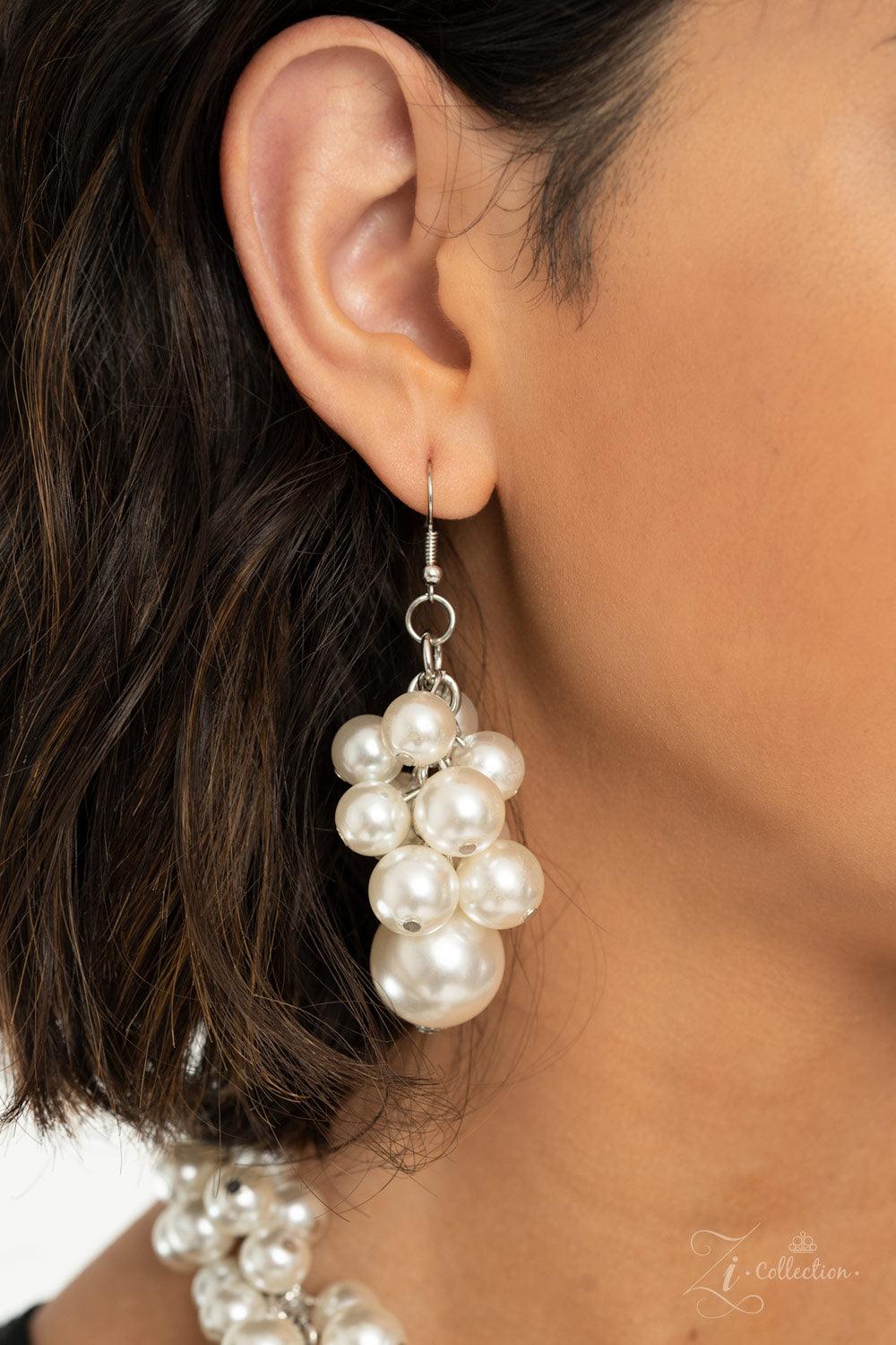 Paparazzi Accessories Regal 💗💗ZiCollection $25💗💗 An exaggerated display of clustered pearls elegantly sweeps below the collar. The classic white pearls gradually increase in bubbly intensity as they reach the center of the regal piece, adding over-the