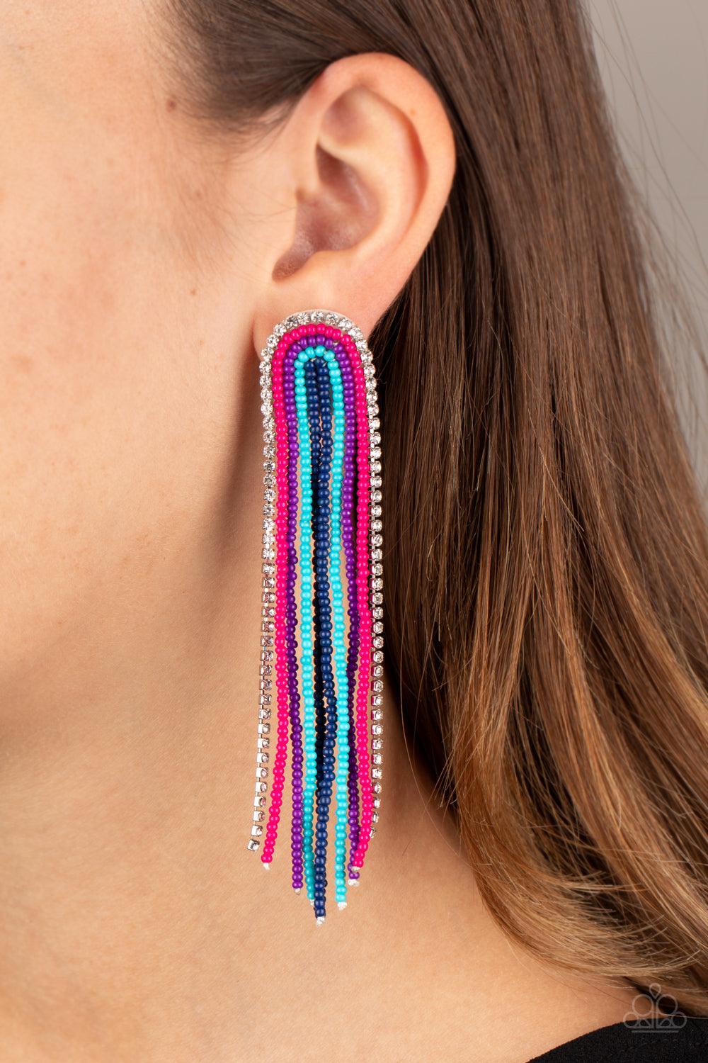 Paparazzi Accessories Let There BEAD Light - Multi Mismatched strands of blue, Pink Peacock, Magenta Purple, and Blue Depths seed beads, and a glittery strand of white rhinestones delicately curls into a beaded rainbow-like tassel. Earring attaches to a s