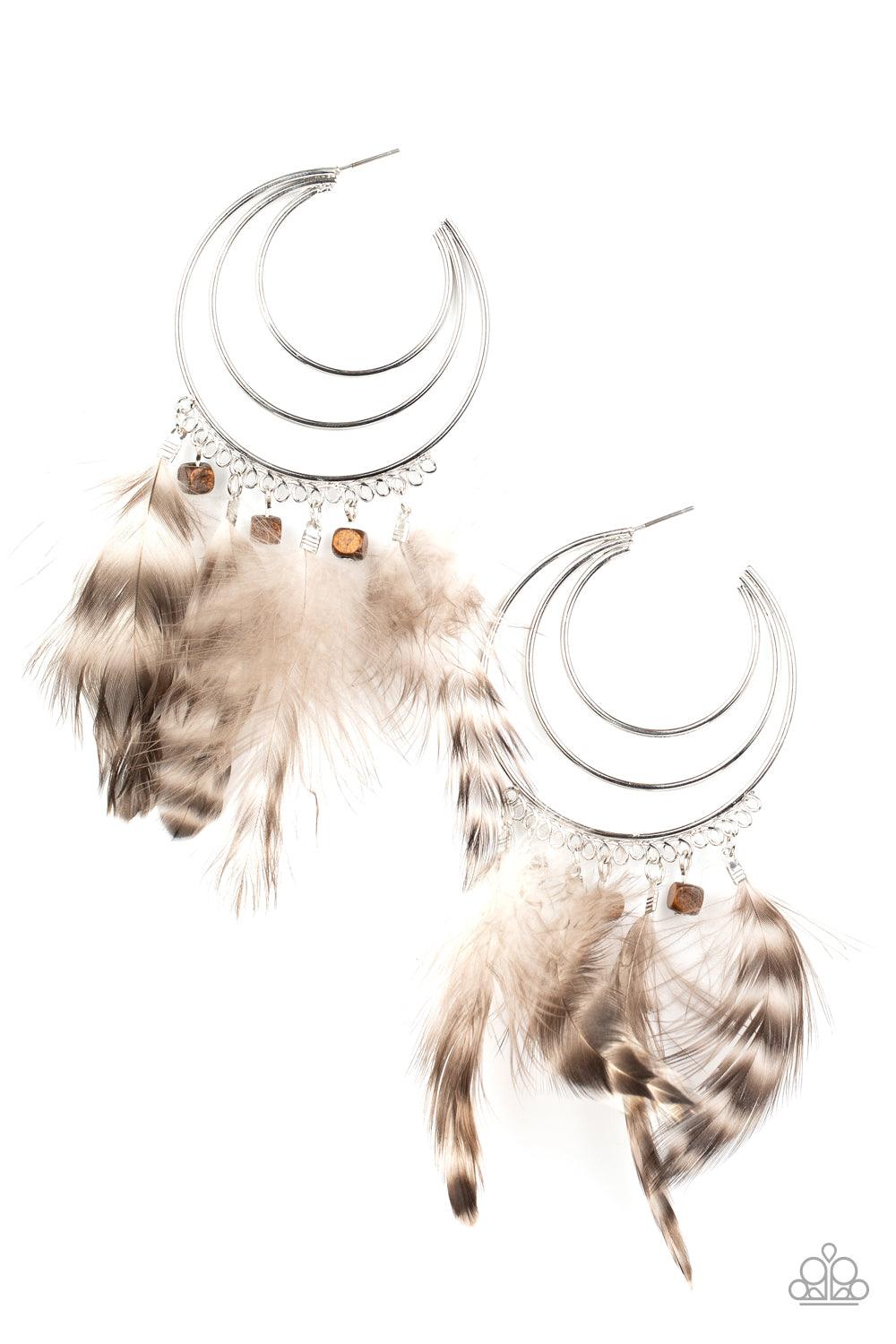 Paparazzi Accessories Freely Free Bird - Brown Whimsical feathers and wooden cube beads swing from the outer edge of a layered silver hoop that ripples out into an airy crescent. Earring attaches to a standard post fitting. Hoop measures approximately 2 1