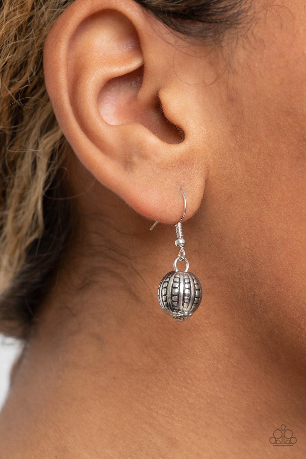 Paparazzi Accessories Desert Revival - White Flanked by ornate silver beads, two oversized white stones give way to an alternating strand of shiny silver and refreshing white stone discs for an authentically artisan inspired look below the collar. Feature