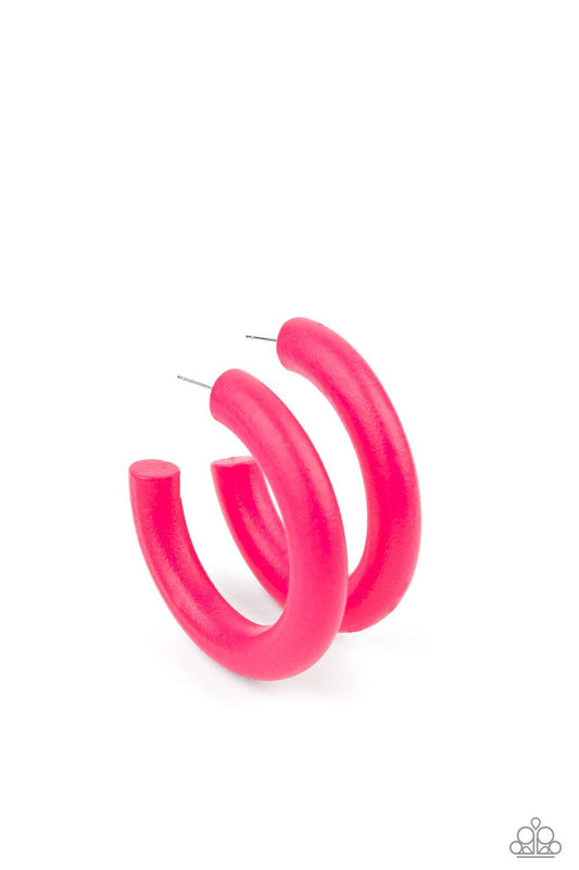 Paparazzi Accessories Woodsy Wonder - Pink Painted in a flamboyant Pink Peacock finish, a thick wood hoop curls around the ear for a flirtatiously colorful look. Earring attaches to a standard post fitting. Hoop measures approximately 2" in diameter. Sold