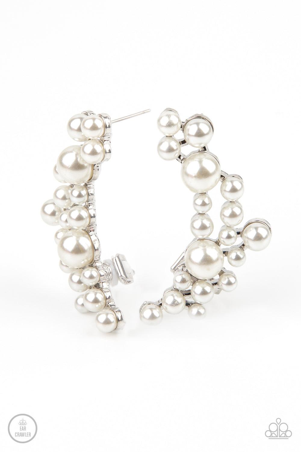 Paparazzi Accessories Metro Makeover - White A collection of bubbly white pearls dot a shiny silver frame that branches up the ear for a modern, timeless twist. Earring attaches to a standard post fitting. Features a clip-on fitting at the top for a secur