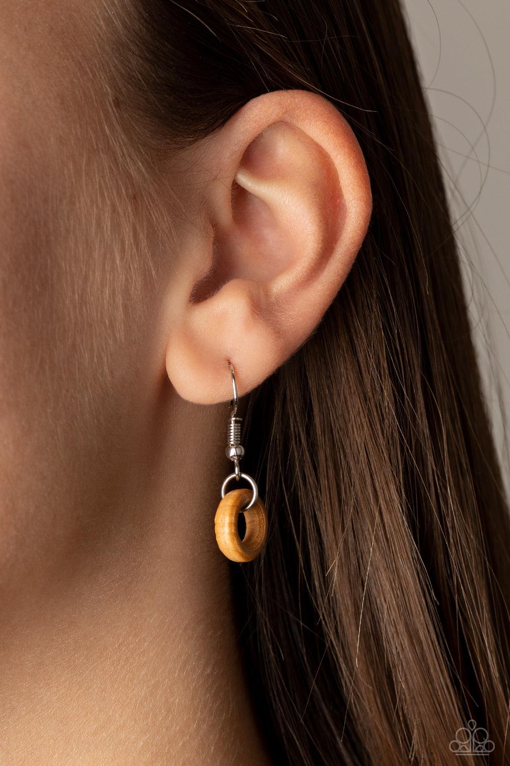 Paparazzi Accessories Bermuda Beaches - Multi Featuring round and cylindrical shapes, mismatched strands of black, brown, tan, and white wooden beads drape across the chest for a summery look. Features an adjustable clasp closure. Sold as one individual n