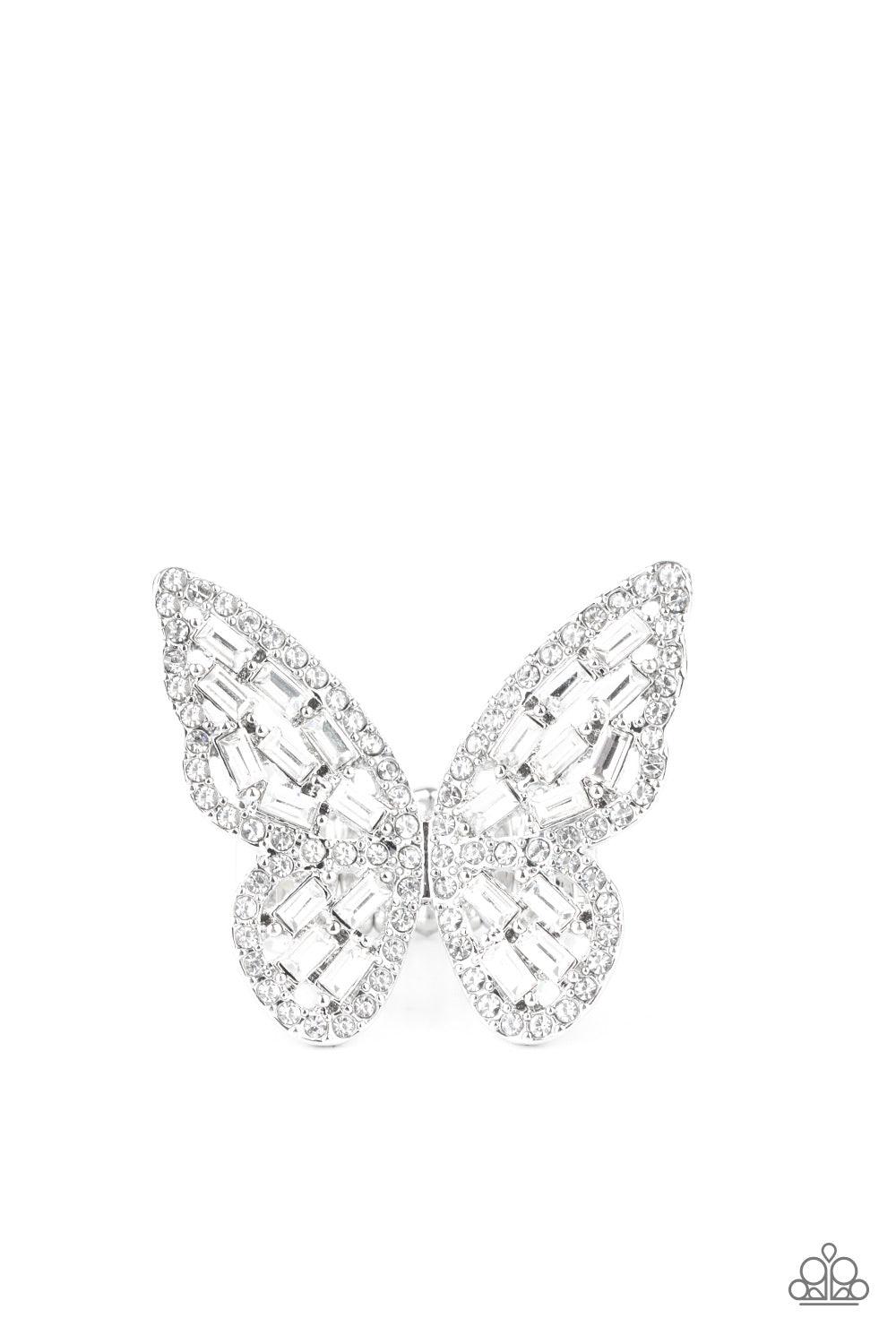 Paparazzi Accessories Flauntable Flutter - White Dainty white emerald style rhinestones are sprinkled across the wings of a silver butterfly that is encrusted in glassy white rhinestones for a dramatically dazzling finish. Features a stretchy band for a f