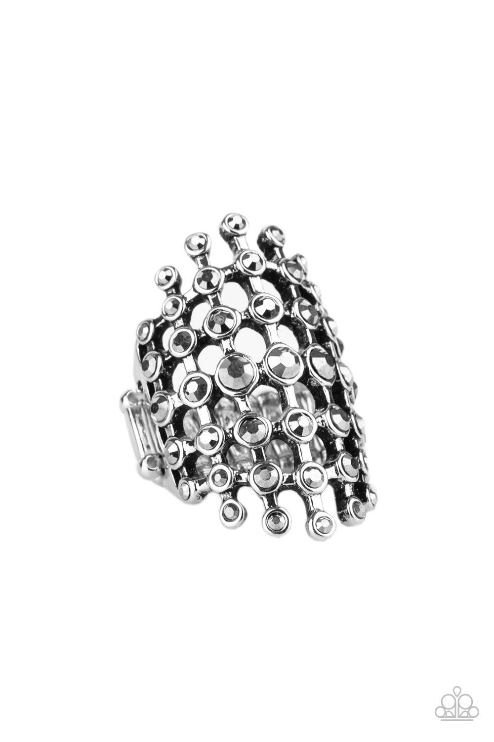 Paparazzi Accessories Fiercely Flashy - Silver Featuring glistening silver fittings, a sparkly series of hematite rhinestones interlock into an edgy grid across the finger for a spellbinding look. Features a stretchy band for a flexible fit. Sold as one i