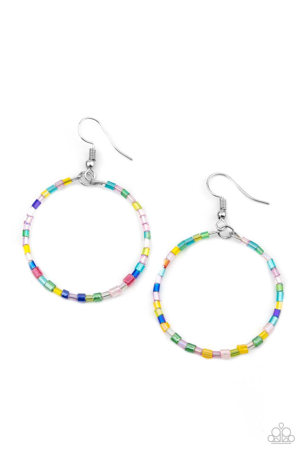 Paparazzi Accessories Colorfully Curvy - Multi Featuring an iridescent shimmer, glassy multicolored seed beads are threaded along a dainty wire hoop for a colorful finish. Earring attaches to a standard fishhook fitting. Sold as one pair of earrings. Jewe