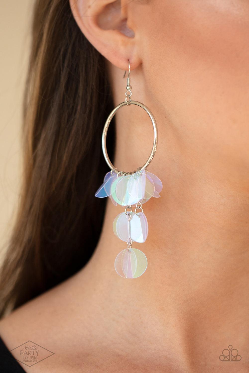 Paparazzi Accessories Holographic Hype - Multi Delicately folded in half, tassels of creased iridescent sequins swing from the bottom of a shiny silver hoop, creating an effervescent fringe. Earring attaches to a standard fishhook fitting. Sold as one pai