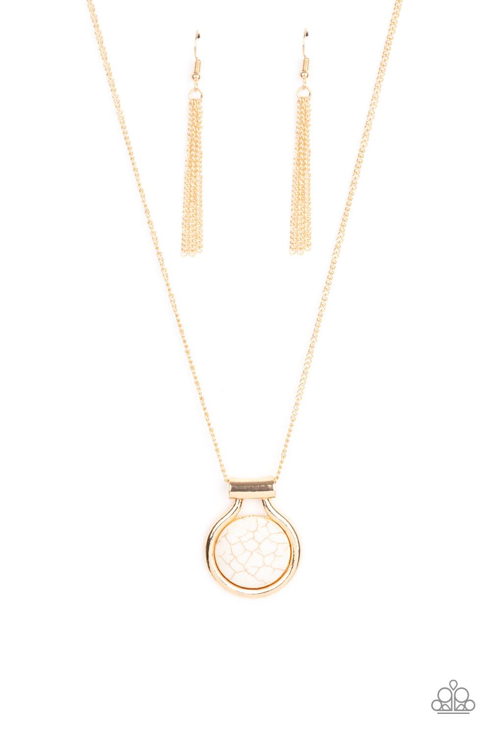 Paparazzi Accessories Patagonian Paradise - Gold Encased in an artisan inspired gold fitting, a refreshing white stone pendant glides along a gold chain for a colorfully seasonal look. Features an adjustable clasp closure. Sold as one individual necklace.