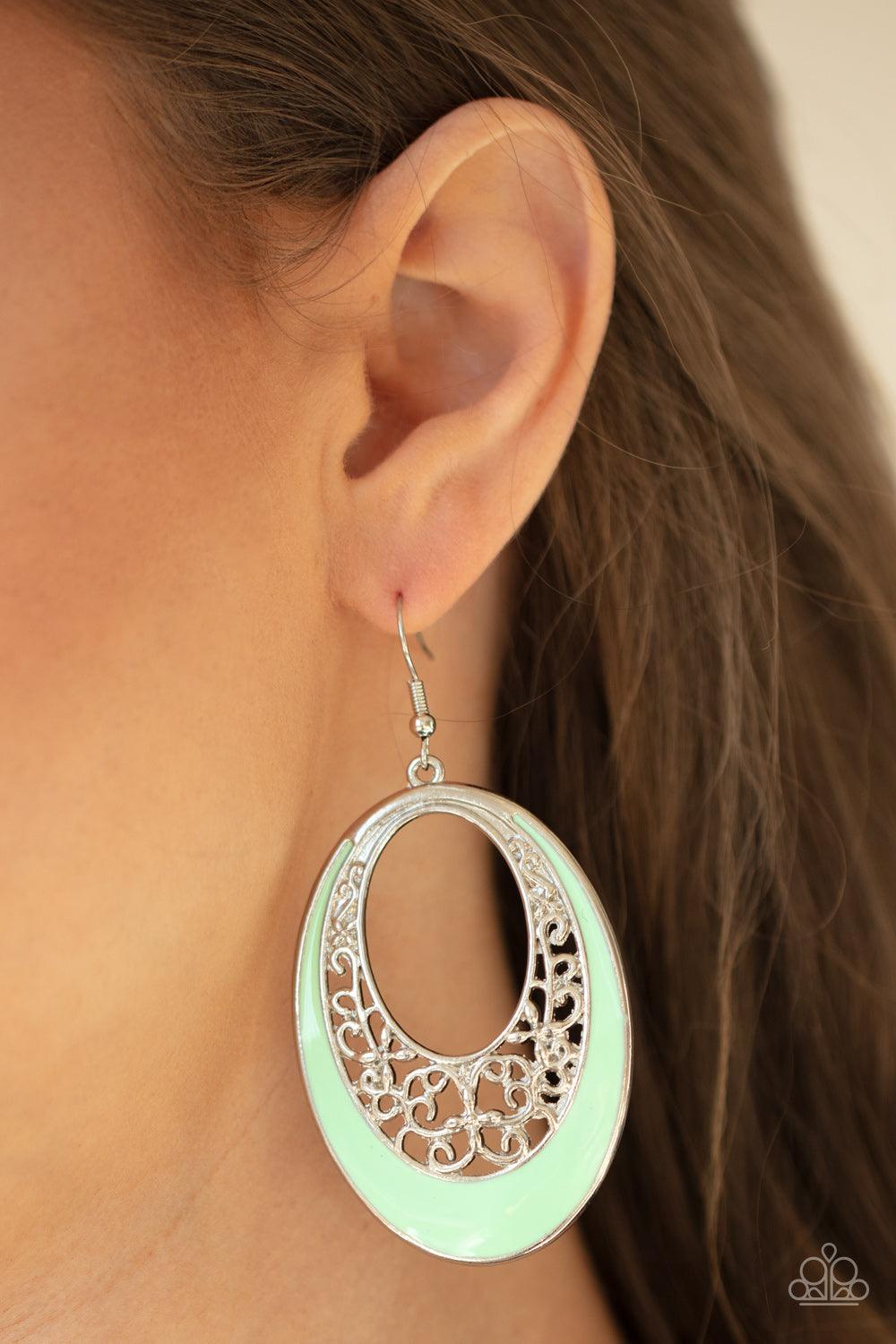Paparazzi Accessories Orchard Bliss - Green Featuring a refreshing Green Ash accent, airy vine-like filigree climbs the inside of a silver oval, creating a colorful display. Earring attaches to a standard fishhook fitting. Sold as one pair of earrings. Je
