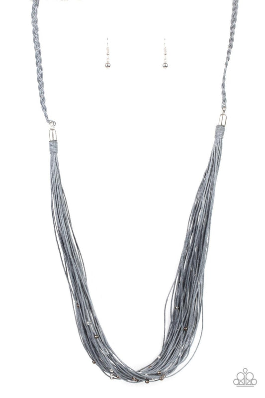 Paparazzi Accessories Homespun Artisan - Silver Speckled with dainty silver and gunmetal beads, rows of gray twine-like cording are knotted in place below two silver fittings that attach to a braided row of matching cording. The earthy display drapes acro