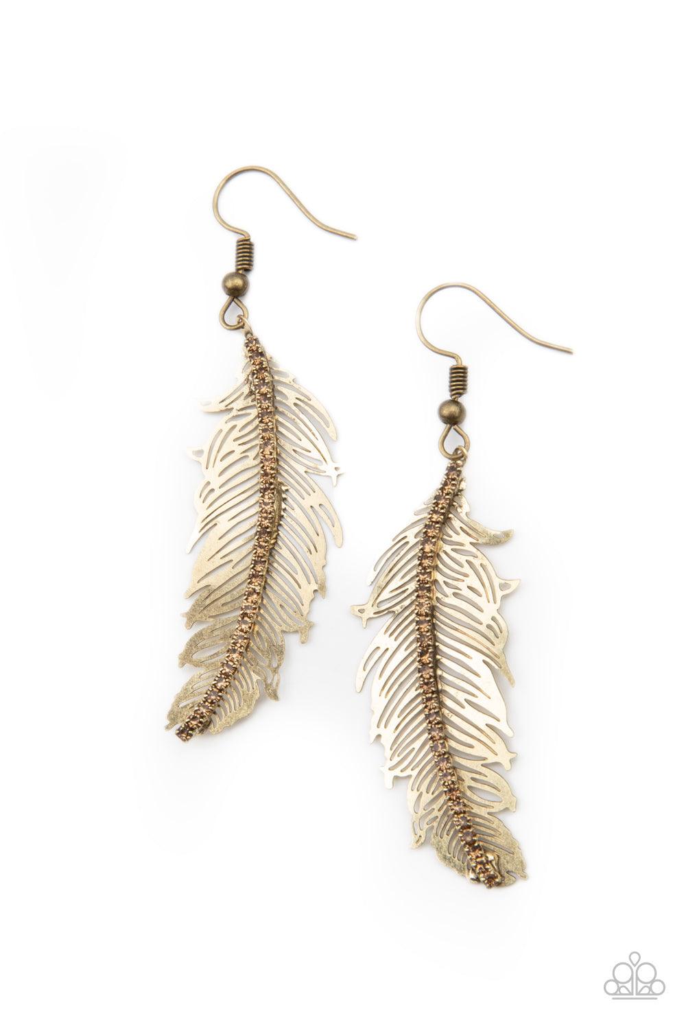 Paparazzi Accessories Fearless Flock - Brass A row of dainty golden topaz rhinestones are encrusted down the spine of a lifelike brass feather, creating a refined frame. Earring attaches to a standard fishhook fitting. Sold as one pair of earrings. Jewelr