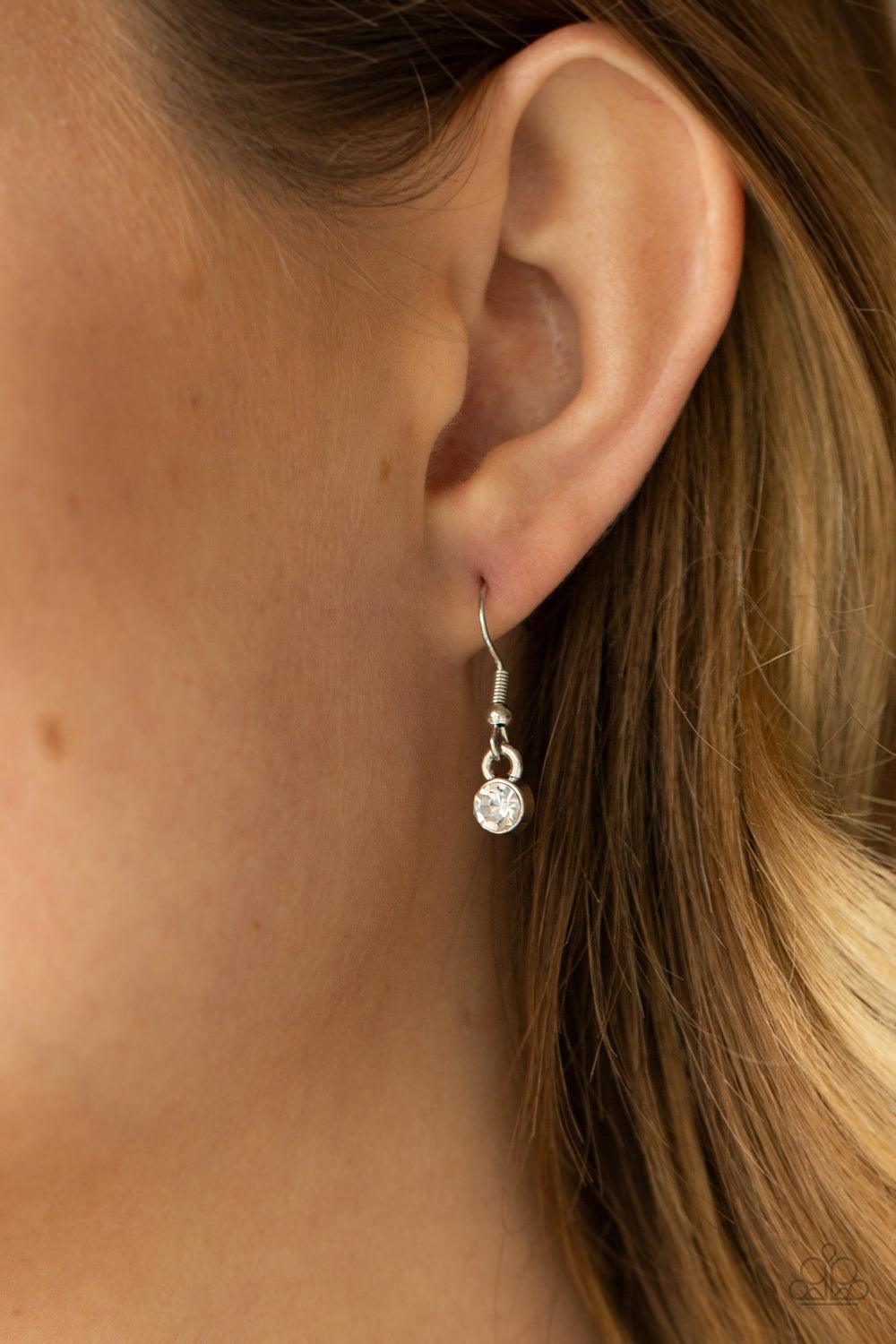 Paparazzi Accessories The Queen Demands It - Red Gradually increasing in size at the center, the sparkly bottoms of oversized red gems are bordered in rows of glassy white rhinestones as they link below the collar for a dramatic effect. Features an adjust