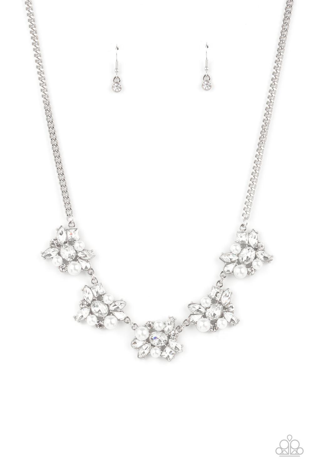 Paparazzi Accessories HEIRESS of Them All - White Bubbly white pearls and regally cut white rhinestones coalesce into blinding frames that glamorously link below the collar, creating a timeless fringe. Features an adjustable clasp closure. Sold as one ind