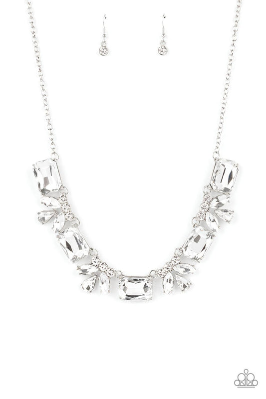 Paparazzi Accessories Long Live Sparkle - White An oversized collection of white emerald cut gems and regally cut clusters of rhinestones delicately link below the collar, creating a dramatically sparkly fringe. Features an adjustable clasp closure. Sold