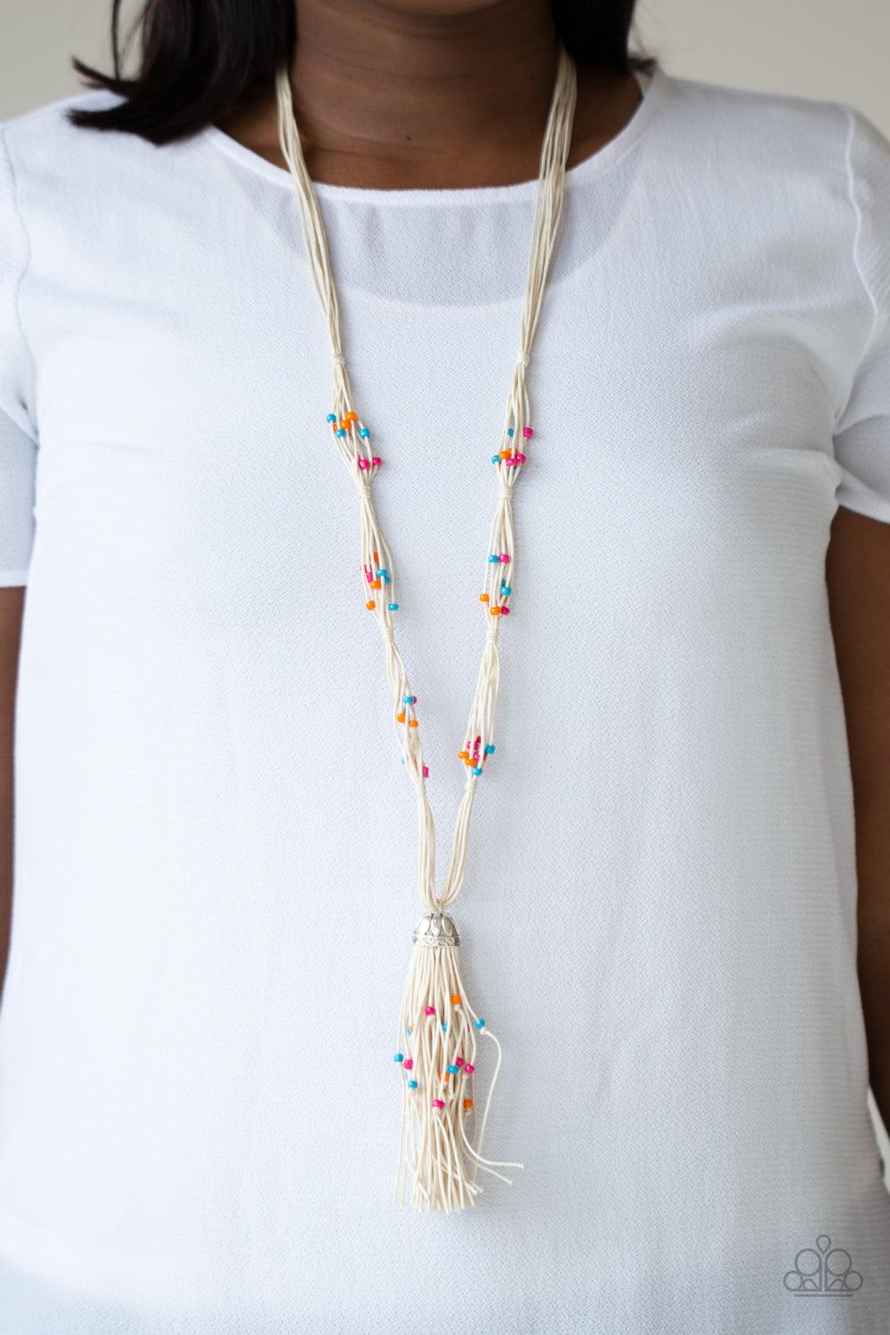 Paparazzi Accessories Summery Sensations - Multi Dainty orange, blue, and pink wooden beads are sporadically threaded along earthy strands of knotted twine-like layers draped across the chest. Matching beaded strands stream out from the bottom of a decora