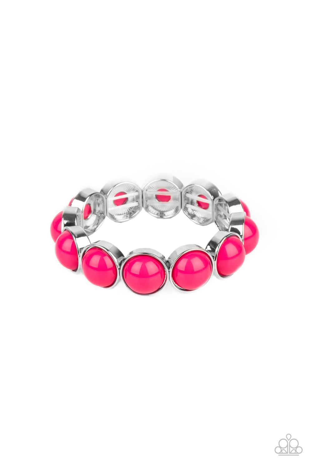 Paparazzi Accessories POP, Drop, and Roll - Pink Featuring flamboyant pink beaded centers, bubbly silver frames are threaded along stretchy bands around the wrist for a powerful pop of color. Sold as one individual bracelet. Jewelry
