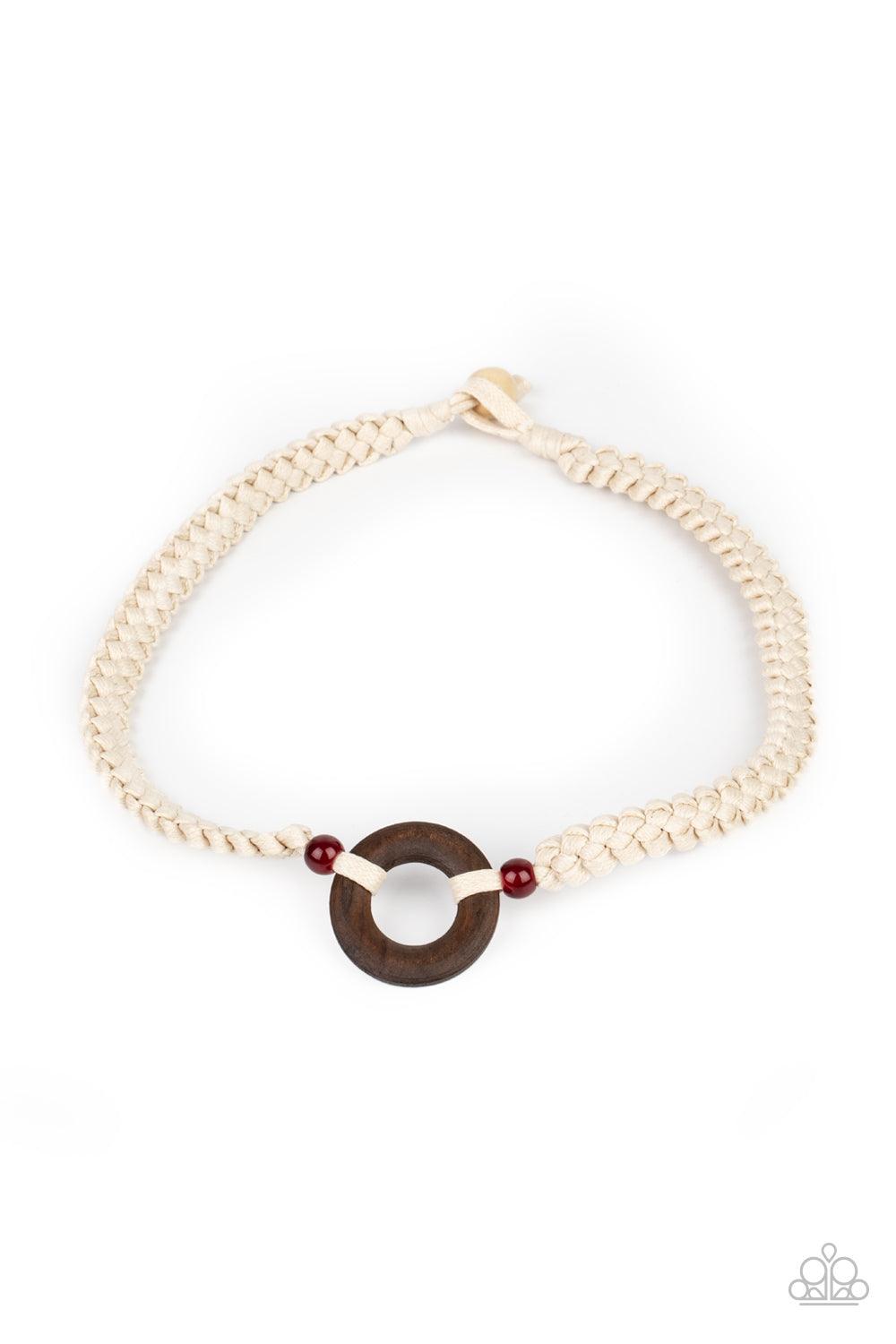 Paparazzi Accessories The MAINLAND Event - Red A wooden hoop is knotted in place between two glassy red beads along braided white cording around the neck for an earthy look. Features a button loop closure. Sold as one individual necklace. Jewelry