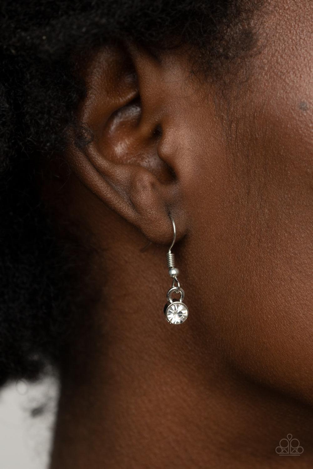 Paparazzi Accessories Duchess Decorum - Blue An oversized Cerulean rhinestone teardrop is pressed into the center of a silver frame bordered in white rhinestones, creating a glamorous pendant below the collar. Features an adjustable clasp closure. Sold as