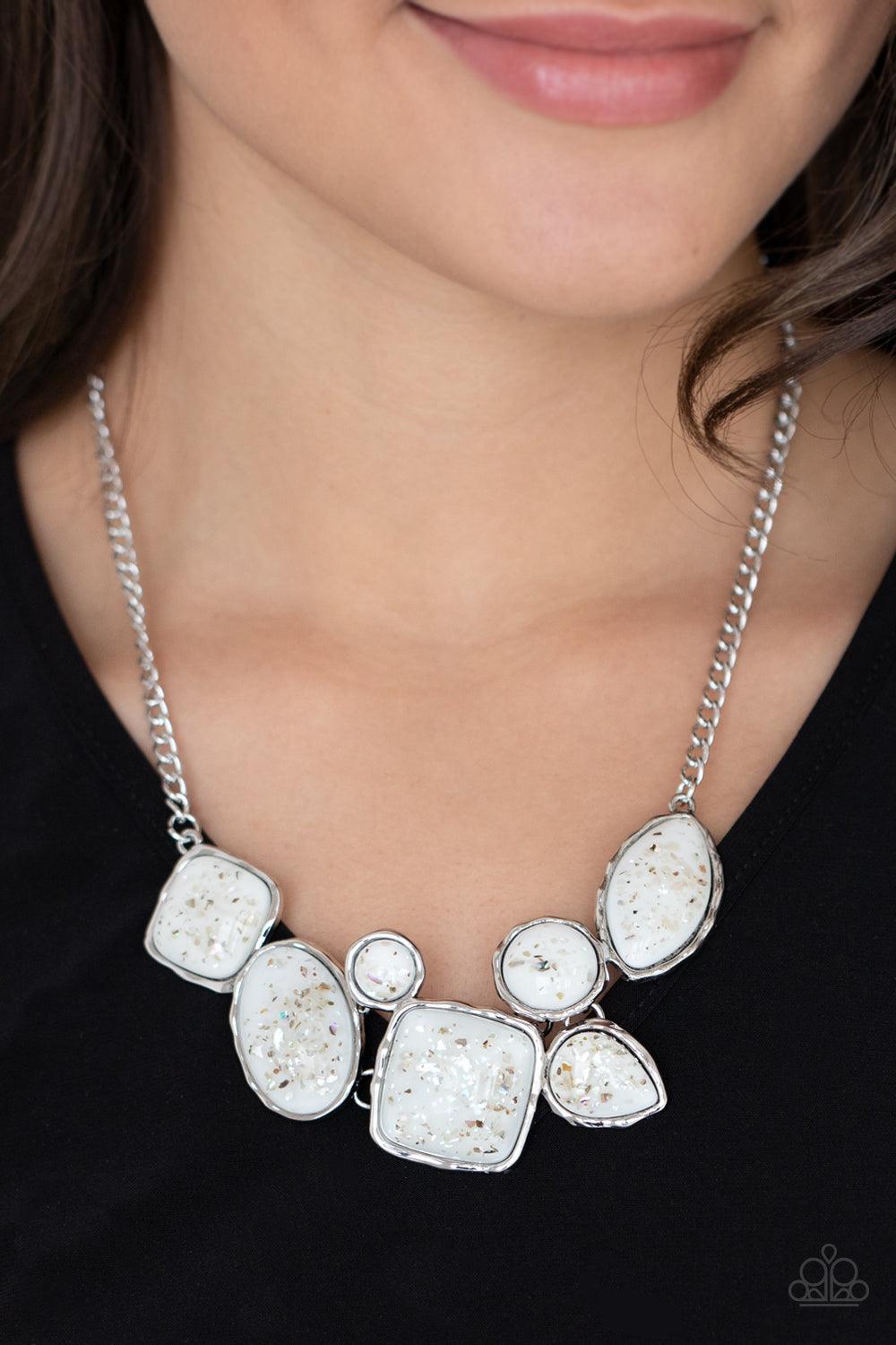 Paparazzi Accessories So Jelly - White Flecks of iridescent shell-like pieces are encased in glassy white beads. Featuring hammered silver frames, the mismatched frames delicately cluster below the collar for an ethereal fashion. Features an adjustable cl