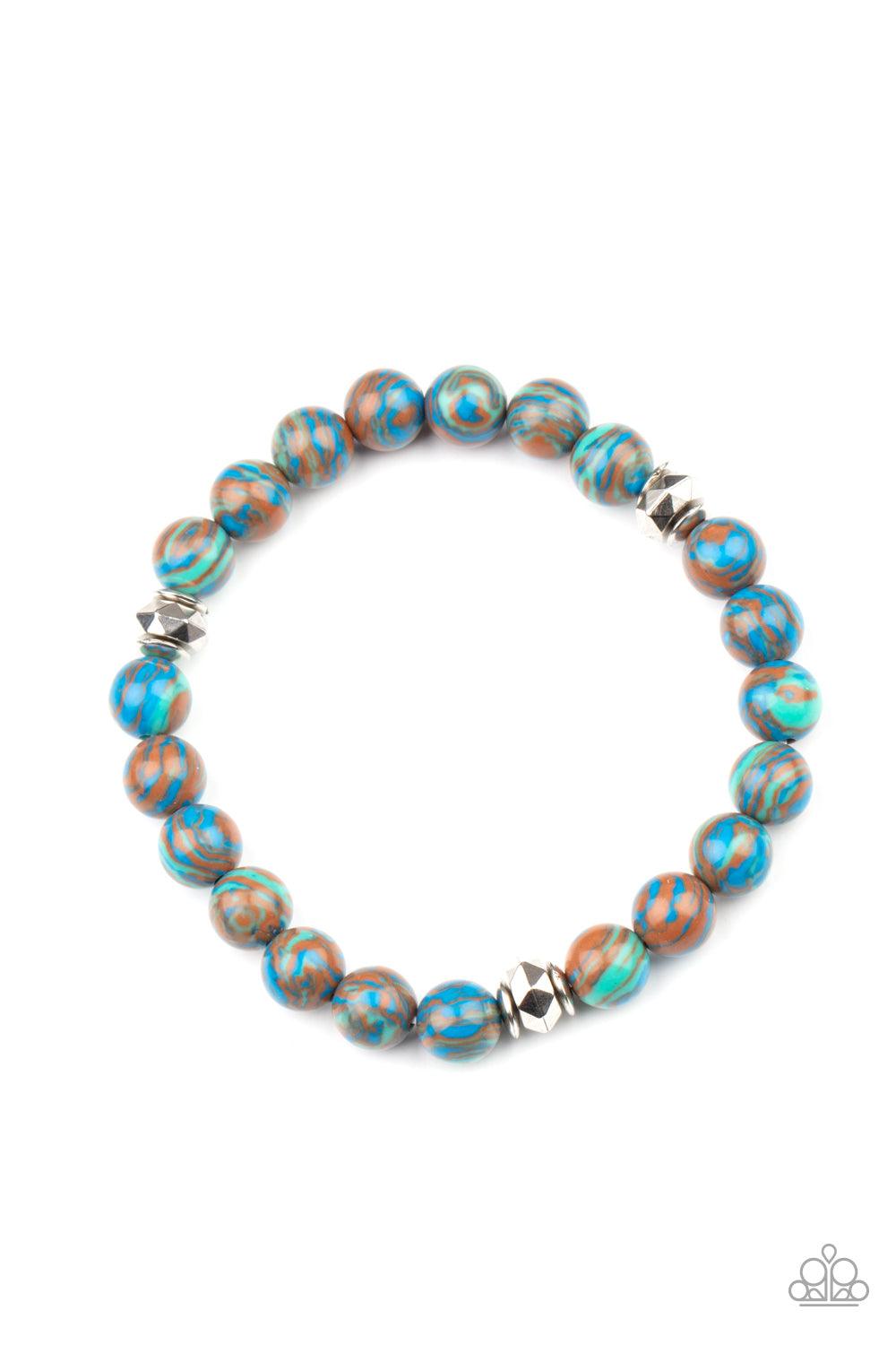 Paparazzi Accessories Awakened - Blue Swirling with blue, green, and brown details, earthy beads and faceted silver accents are threaded along a stretchy band around the wrist for a tranquil look. Sold as one individual bracelet. Jewelry