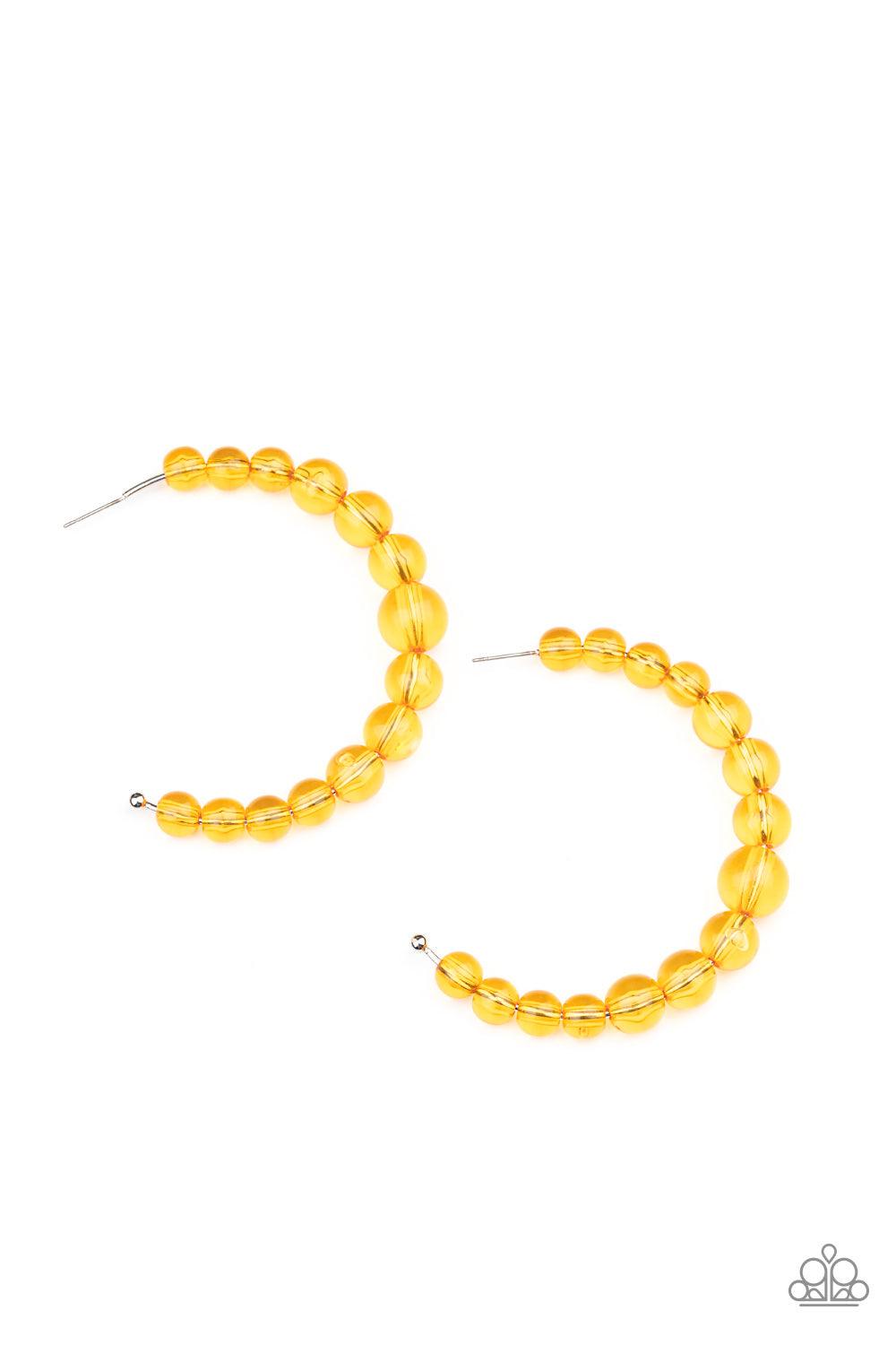 Paparazzi Accessories In The Clear - Orange Gradually increasing in size at the center, a glassy collection of Marigold beads are threaded along an oversized hoop for a bubbly effect. Earring attaches to a stand post fitting. Hoop measures approximately 2
