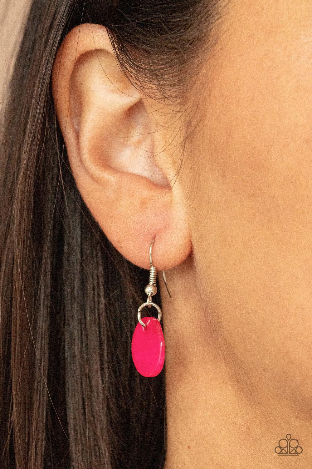 Paparazzi Accessories Tidal Tassels - Pink Featuring cylindrical silver accents, iridescent pink shell-like discs swing from the ends of knotted Ultimate Gray cords, creating a flamboyant tassel. Features an adjustable sliding knot closure. Sold as one in