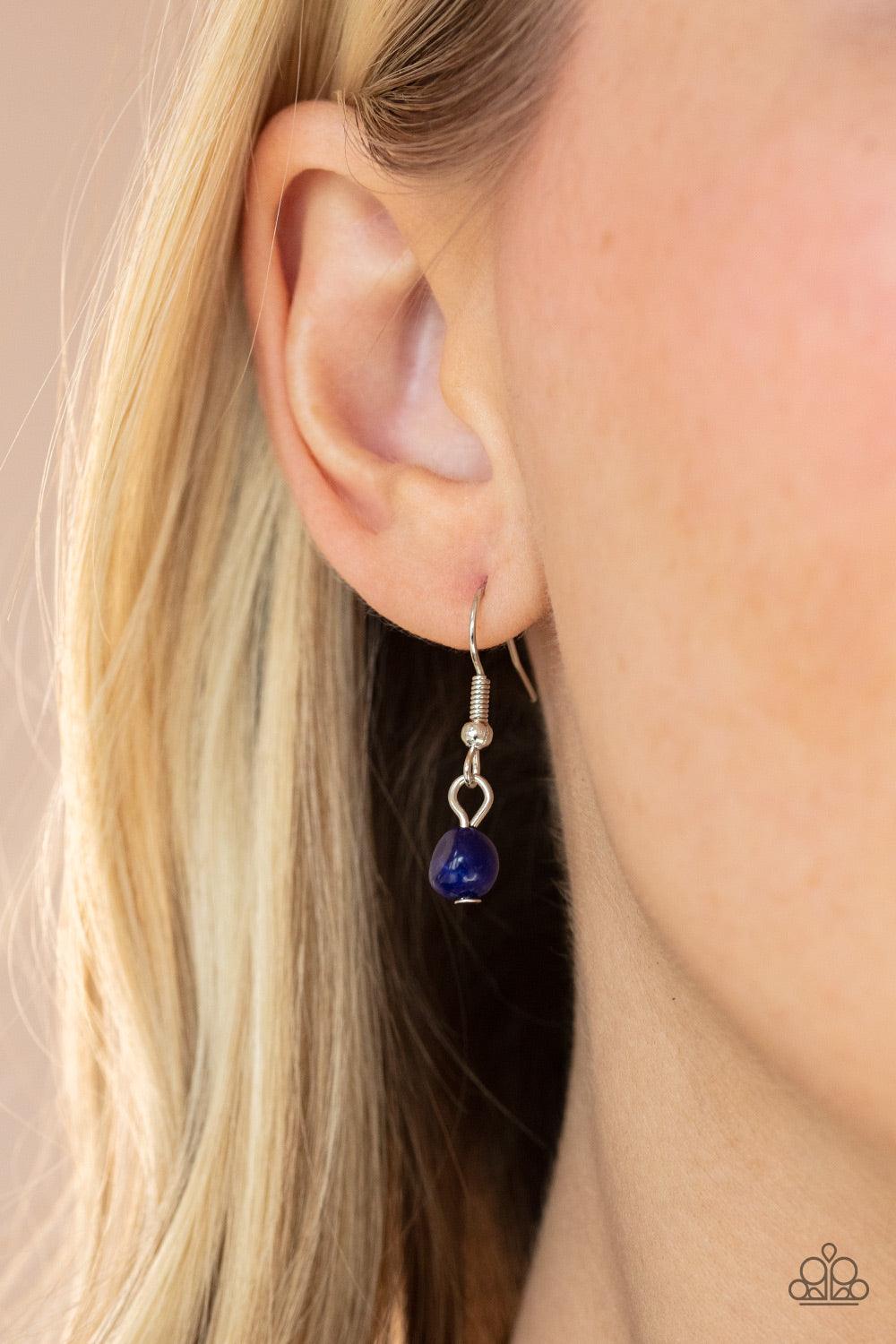 Paparazzi Accessories With Your ART and Soul - Blue Dainty silver rods swing from the bottom of a bowing silver fitting that attaches to sections of lapis pebbles at the bottom of a silver chain, creating a whimsically seasonal display. Features an adjust