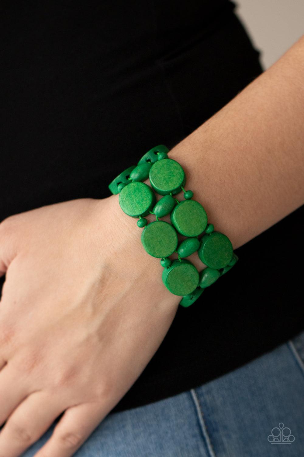 Paparazzi Accessories Beach Bravado - Green Earthy green wooden discs and beads are threaded along braided stretchy bands around the wrist, creating a summery display. Sold as one individual bracelet. Bracelets