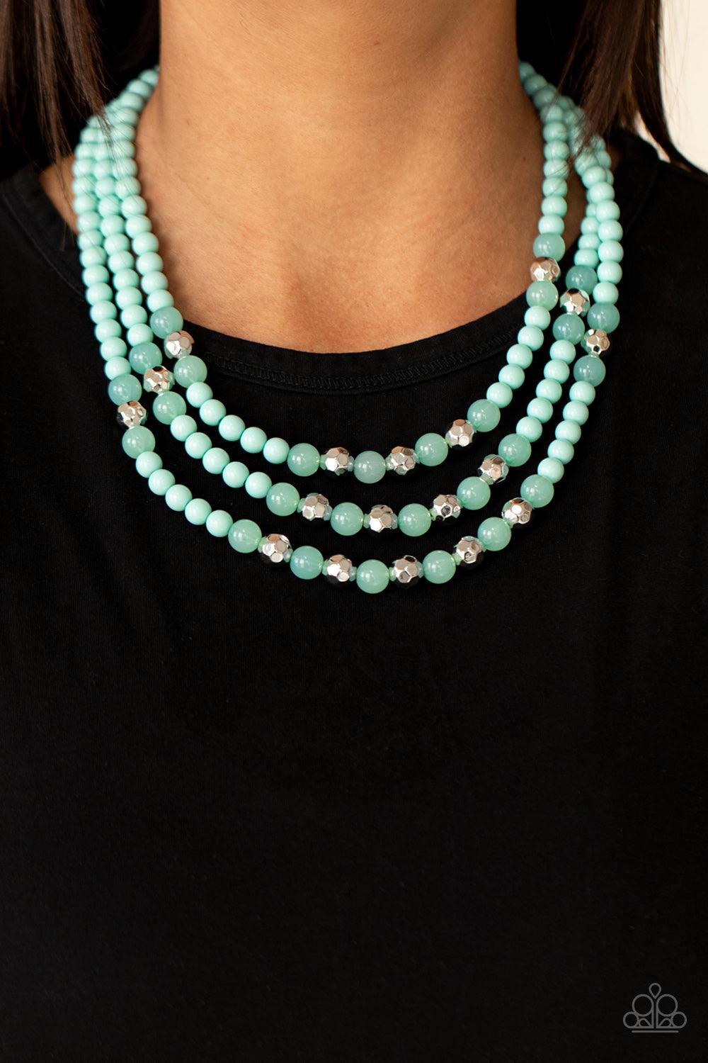 Paparazzi Accessories STAYCATION All I Ever Wanted - Blue A colorful collection of polished and opaque Blue Radiance beads and faceted shiny silver beads are threaded along invisible wires across the chest, creating vivacious layers. Features an adjustabl