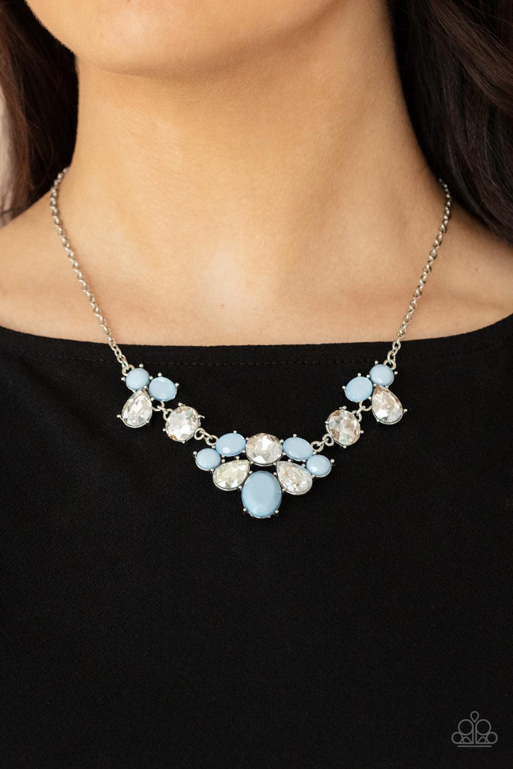 Paparazzi Accessories Ethereal Romance - Blue Varying in opacity and shape, mismatched Cerulean beads attach to oversized white rhinestones, creating bubbly frames that delicately link into an ethereal display below the collar. Features an adjustable clas