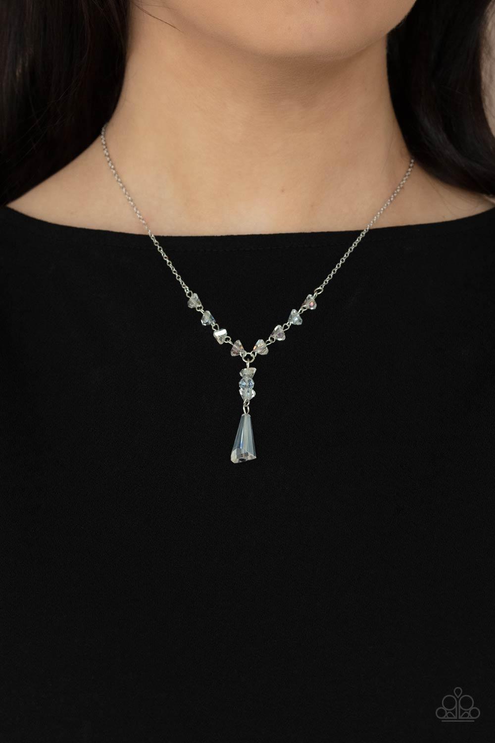 Paparazzi Accessories Olympian Oracle - White Featuring an iridescent shimmer, raw cut glassy beads trickle along a dainty silver chain, giving way to a tranquil crystal-like pendant below the collar. Features an adjustable clasp closure. Sold as one indi