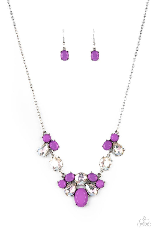 Paparazzi Accessories Ethereal Romance - Purple Varying in opacity and shape, mismatched purple beads attach to oversized white rhinestones, creating bubbly frames that delicately link into an ethereal display below the collar. Features an adjustable clas