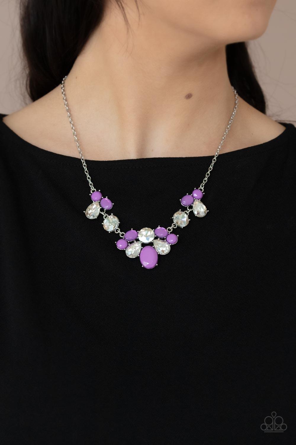 Paparazzi Accessories Ethereal Romance - Purple Varying in opacity and shape, mismatched purple beads attach to oversized white rhinestones, creating bubbly frames that delicately link into an ethereal display below the collar. Features an adjustable clas