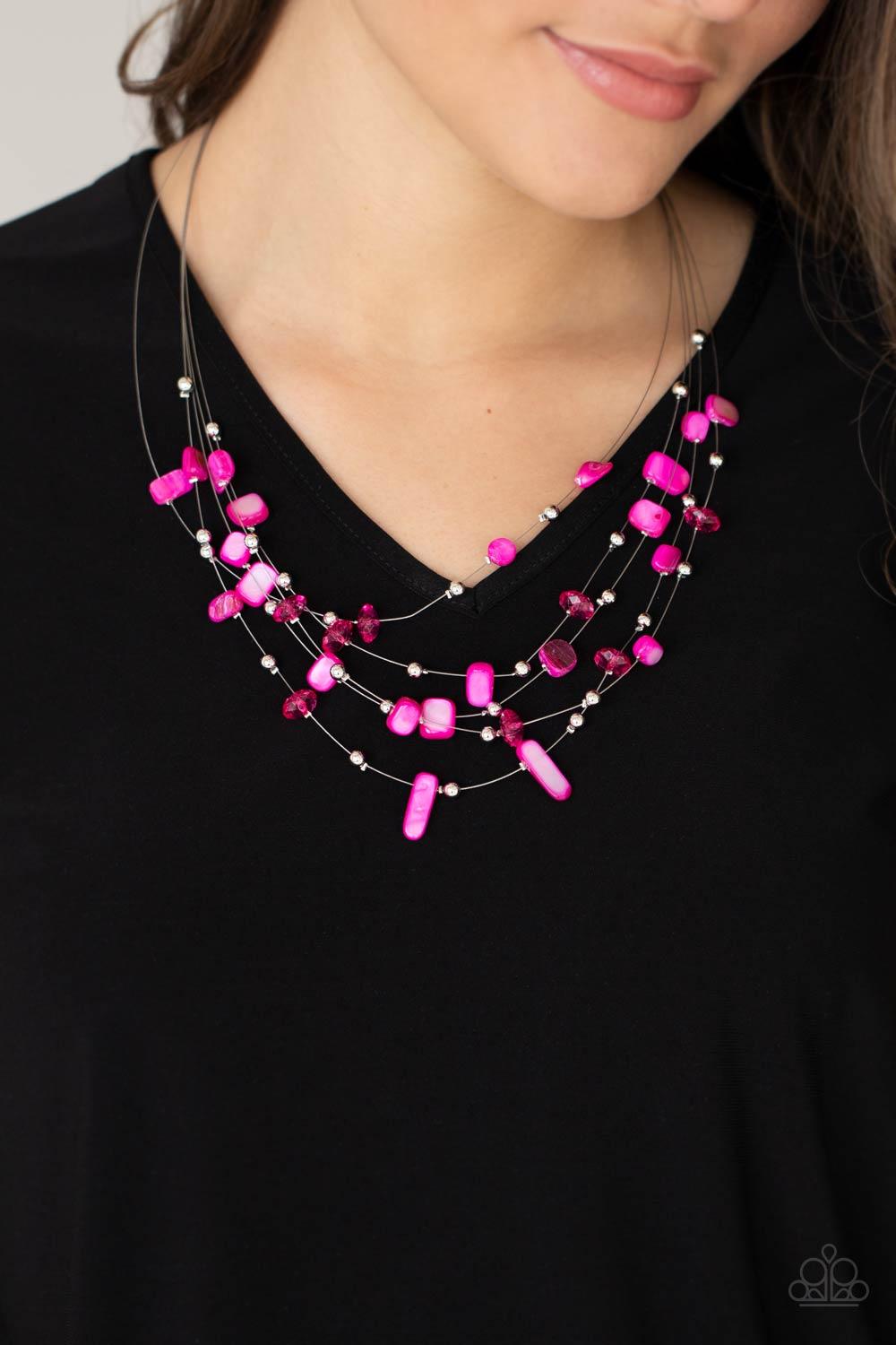 Paparazzi Accessories Prismatic Pebbles - Pink Dainty silver beads, pink crystal-like beads, and shell-like pink pebbles are fitted in place along strands of dainty wires, creating colorful layers below the collar. Features an adjustable clasp closure. So