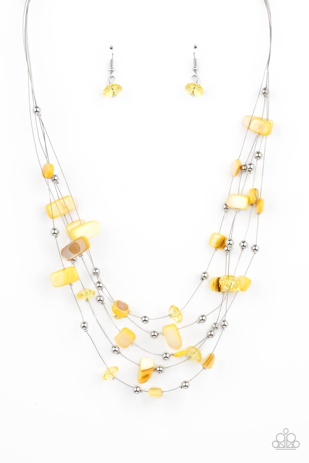 Paparazzi Accessories Prismatic Pebbles - Yellow Dainty silver beads, yellow crystal-like beads, and shell-like yellow pebbles are fitted in place along strands of dainty wires, creating colorful layers below the collar. Features an adjustable clasp closu