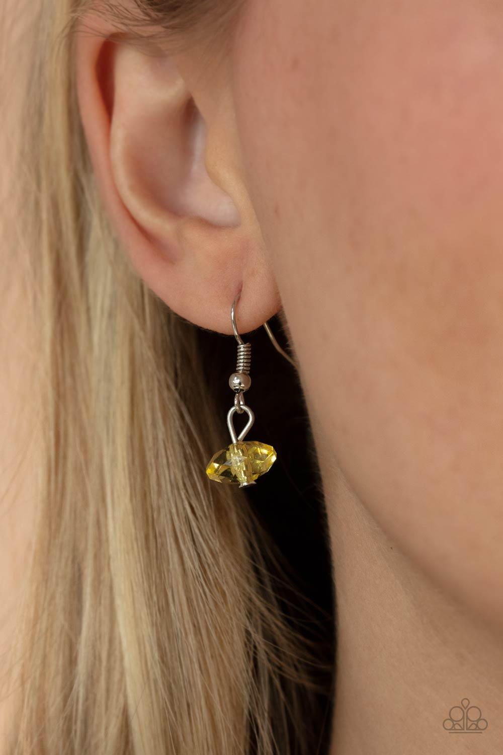 Paparazzi Accessories Prismatic Pebbles - Yellow Dainty silver beads, yellow crystal-like beads, and shell-like yellow pebbles are fitted in place along strands of dainty wires, creating colorful layers below the collar. Features an adjustable clasp closu