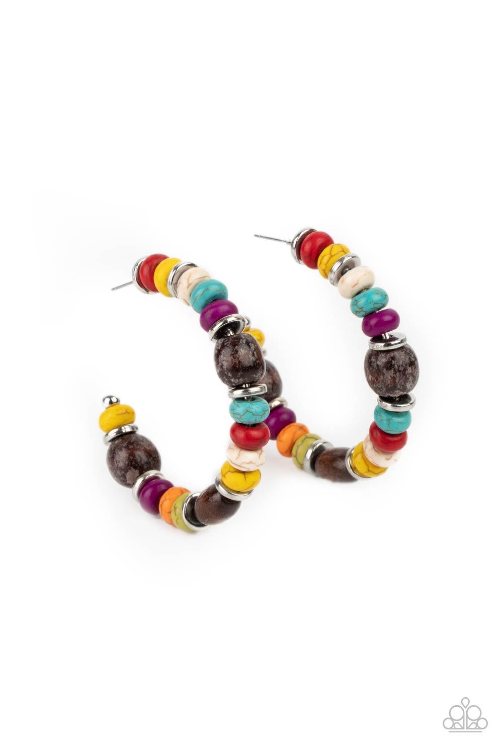 Paparazzi Accessories Definitely Down-To-Earth - Multi An earthy collection of multicolored stone beads, silver discs, and brown wooden beads are delicately threaded along a dainty wire, creating an artisan inspired hoop. Earring attaches to a standard po
