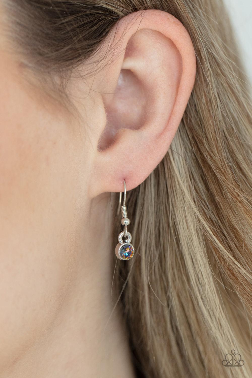 Paparazzi Accessories Cosmic Countess - Multi Double stacks of iridescent multi-colored oval cut gems link elegantly across the collar on a silver chain for a deliriously cosmic flair of glamour. Features an adjustable clasp closure. Sold as one individua