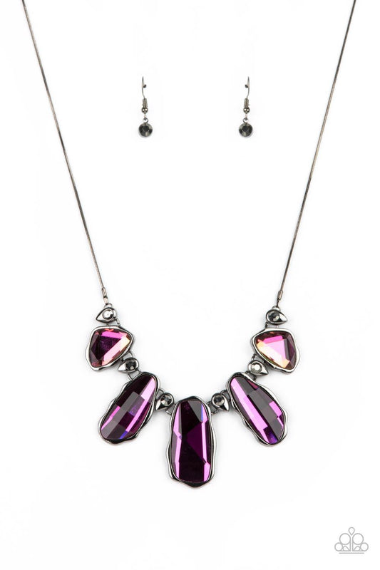 Paparazzi Accessories Cosmic Cocktail - Multi Featuring a UV shimmer, a glittery collection of raw cut iridescent gems delicately link with dainty hematite rhinestone dotted gunmetal teardrops below the collar, creating a stellar fringe. Features an adjus
