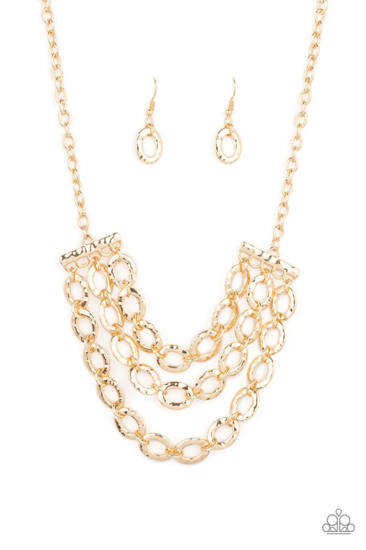Paparazzi Accessories Repeat After Me - Gold Three rows of gold chains with oversized hammered oval links attach to gold bars for an edgy display below the collar. Features an adjustable clasp closure. Sold as one individual necklace. Includes one pair of
